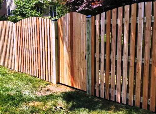 wood fence and gate arched